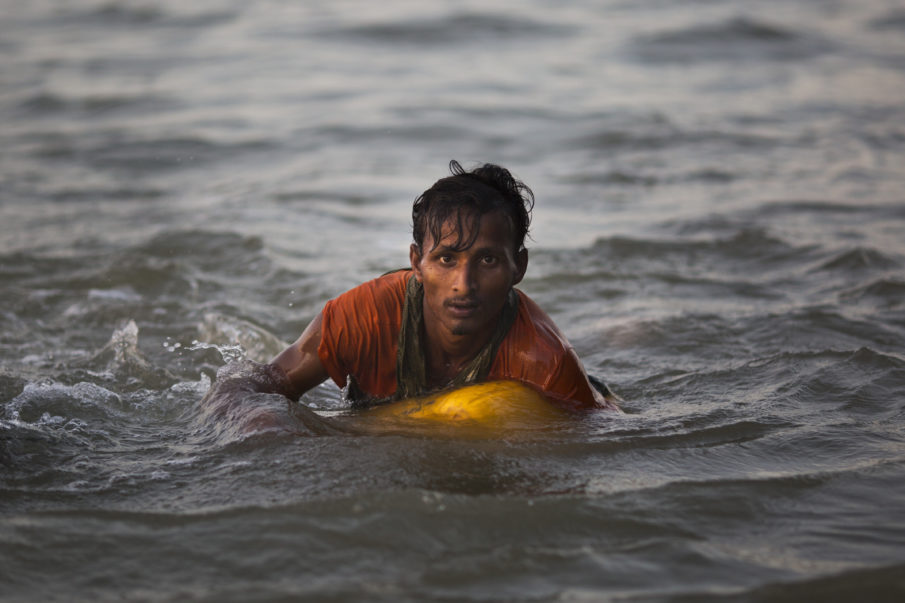Watch: Rohingya civilians use empty gas cans as flotation devices to escape the Burmese Army
