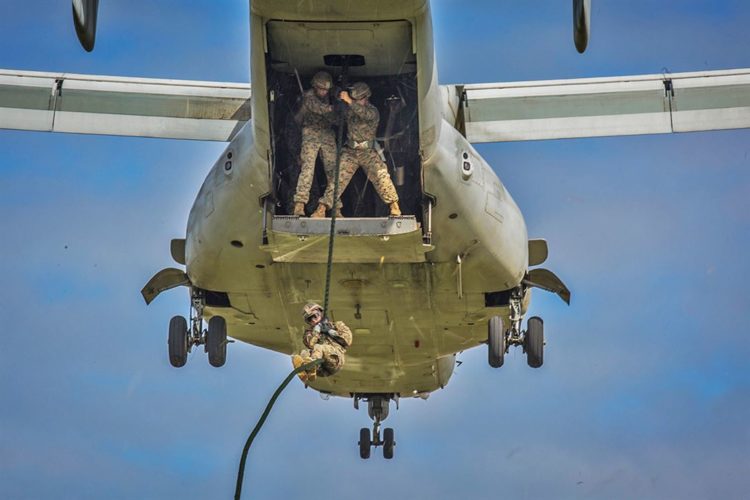 Picture of the Day: Marine Descends from MV-22B Osprey During Training at Camp Hansen