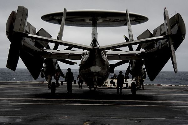 Sailors prepare to move E-2D Hawkeye VAW 120 & Hawkeye Ball