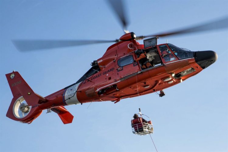 Picture of the Day: To The Rescue! Coast Guard MH-65 Dolphin Rescue Helicopter Medevacs Distressed Fisherman