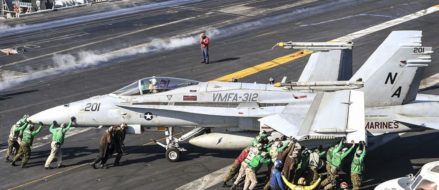 How many sailors does it take to move a Hornet?