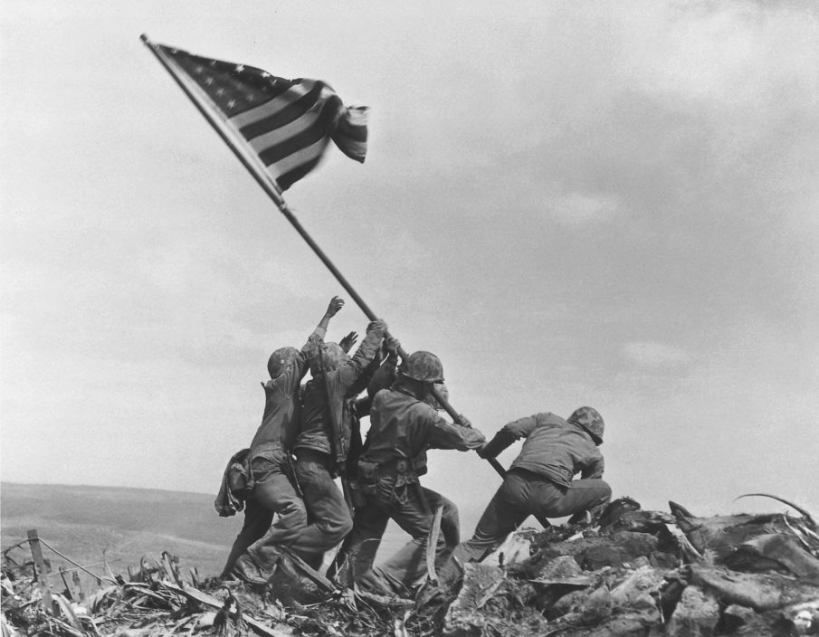 On this day in history: United States Marines raise the American flag atop Mt. Suribachi