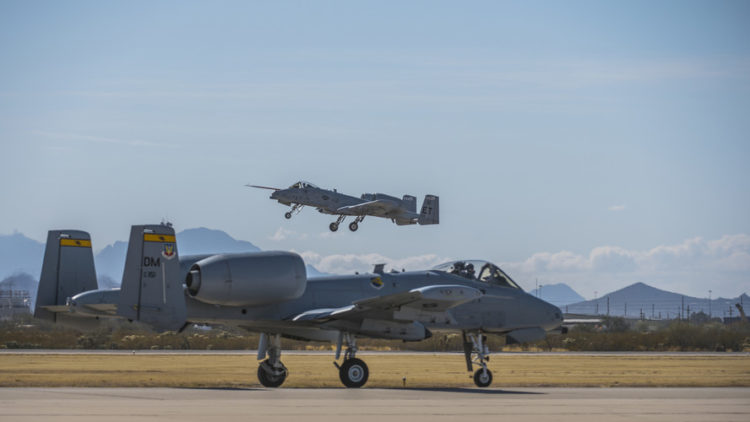 Picture of the Day: A-10C Thunderbolt II Taxiing While Another A-10 Takes to the Sky