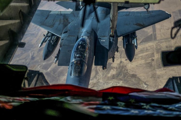 Picture of the Day: F-15E Strike Eagle Re-fueling from a KC-10 Extender Somewhere in Southwest Asia