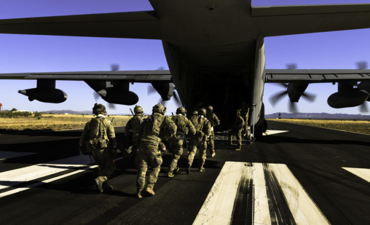 Picture of the Day: Rescue Personnel Load onto an HC-130J Combat King II