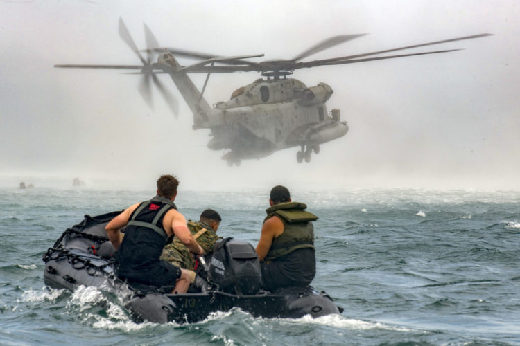 Picture of the Day: U.S. Marines Depart the Drop Zone During Helicopter Casting Training
