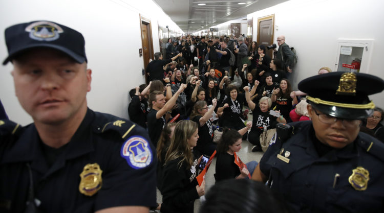 The Pic of the Day: Capitol Hill Police move protestors back during Kavanaugh hearings