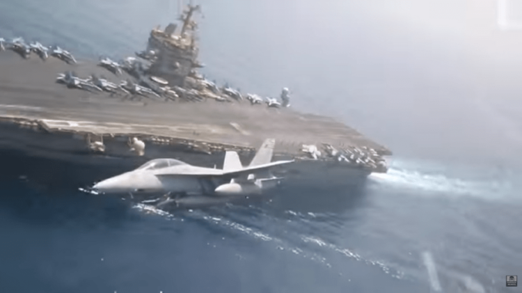 Watch: Video shot inside the cockpit of a Super Hornets as they make high-speed passes over the USS Enterprise