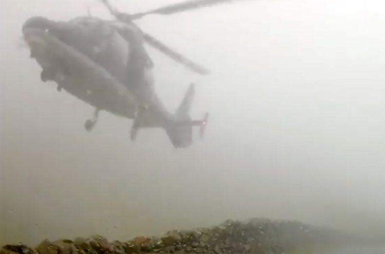 Captured on video: SAS chopper almost collides with family