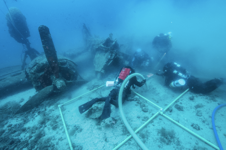 Watch: Divers work to recover bodies of lost WWII bomber crew