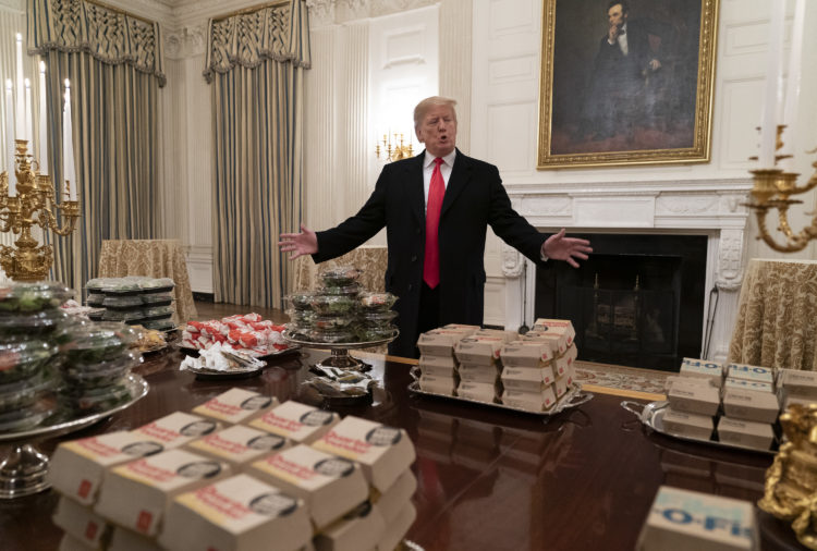 The Pic of the Day: Trump serves fast food feast to the Clemson Tigers