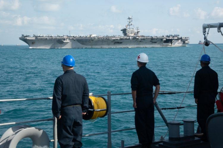 The Pic of the Day: Watching the USS John C. Stennis cruise by in the South China Sea