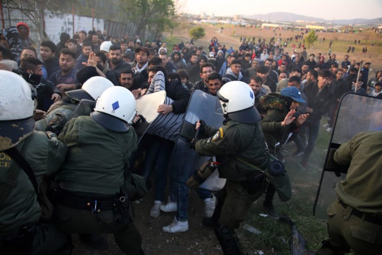 The Pic of the Day: Migrants skirmish with riot police in Greece