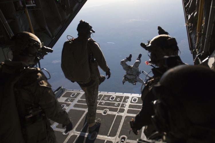 Australian newspaper raided after publishing stories about war crimes and government surveillance