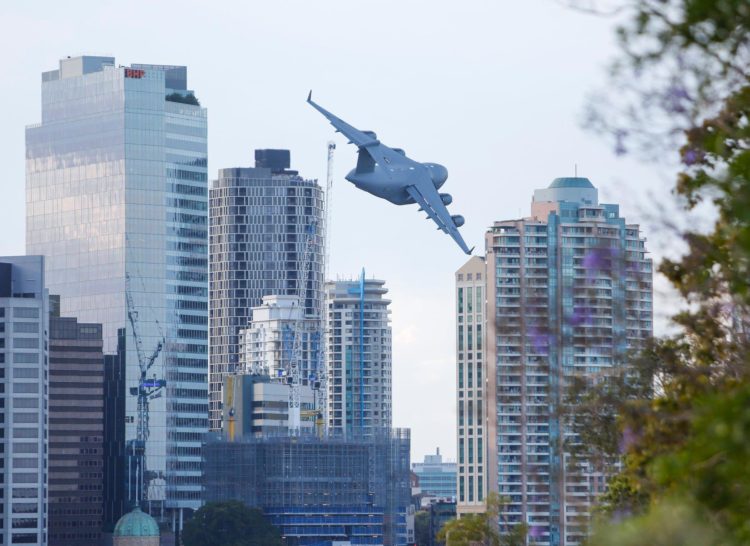 Watch: Cockpit video of a C-17 flying low between skyscrapers