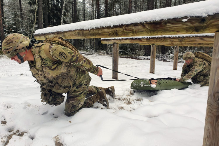 Soldiers Practice Winter Casualty Evacuation