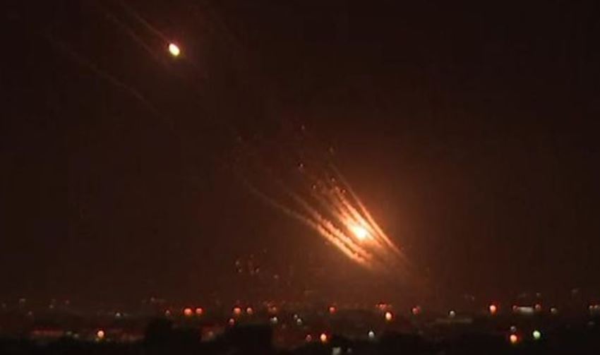 Israeli Iron Dome missiles target incoming rockets from Gaza over the city of Jerusalem.