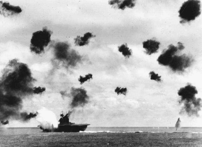 The USS Yorktown is hit by Japanese airstrikes during the Battle of Midway.