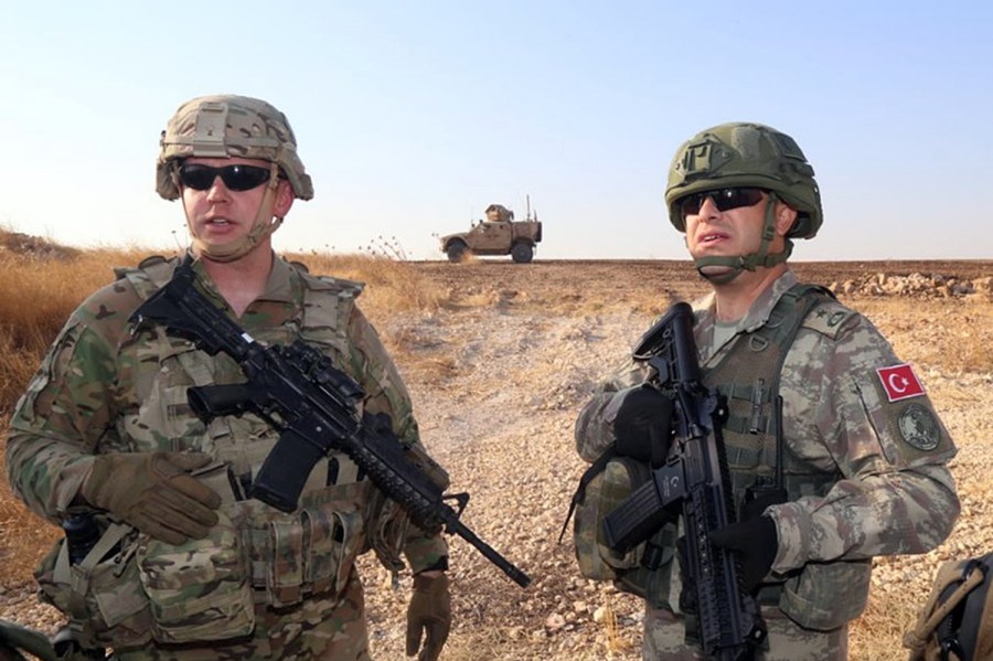A Turkish and an American troop.
