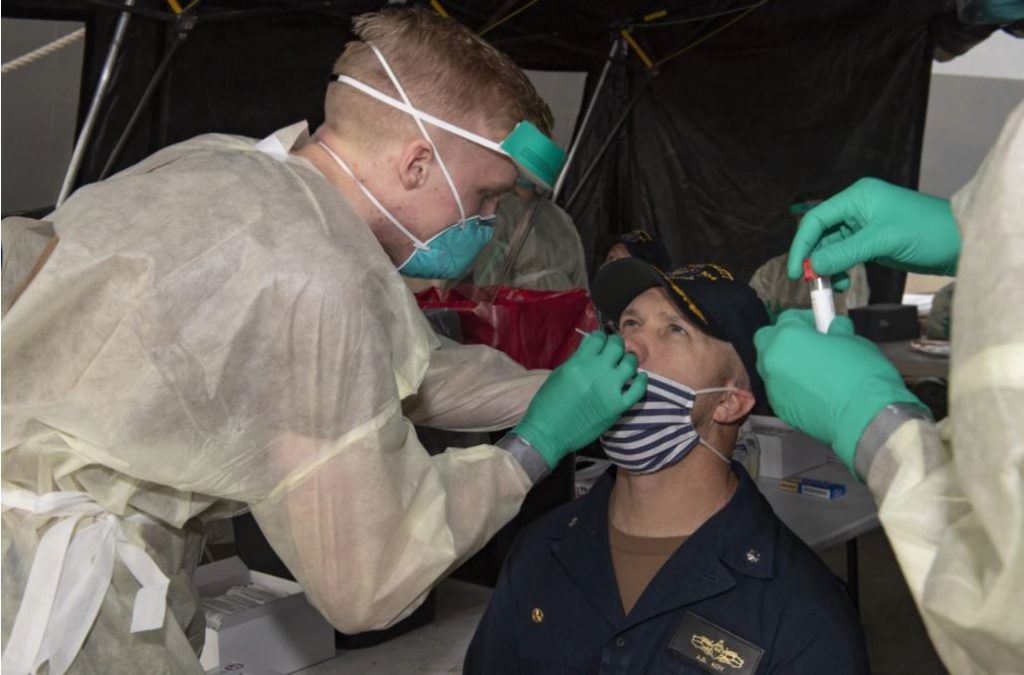 Navy personnel being tested for COVID-19.
