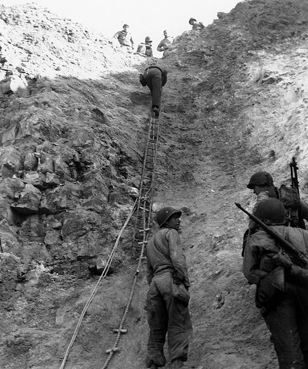 Rangers from the 2nd Battalion scale the cliffs at Point du Hoc in Normandy