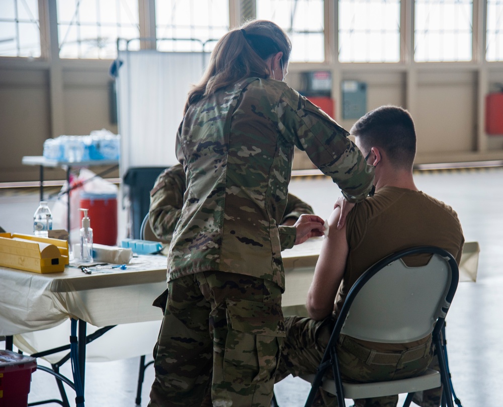 Airman getting COVID vaccine
