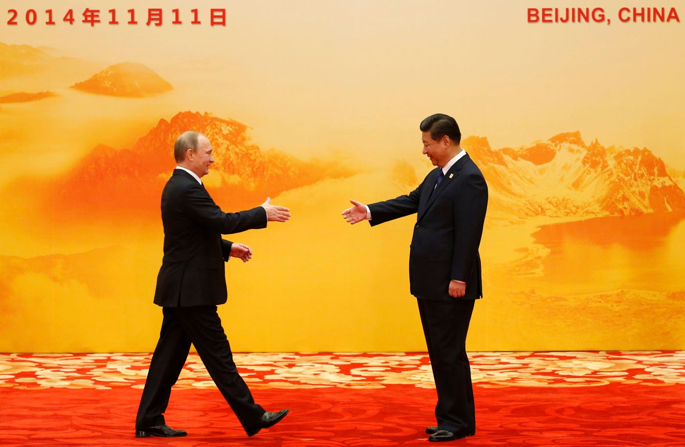 Vladimir Putin meets Xi Jinping
