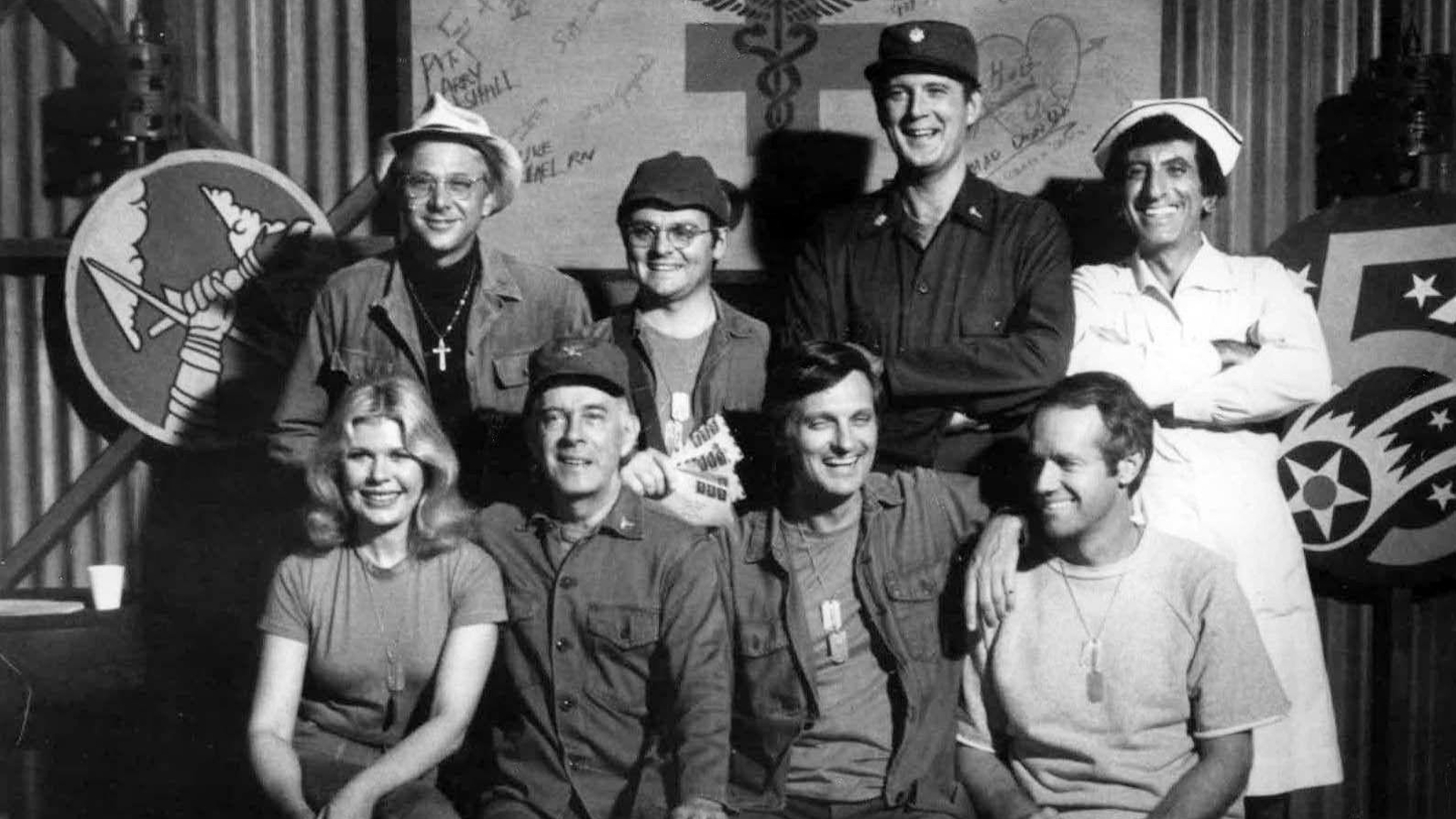Cast photo from M*A*S*H Loretta Swit, Harry Morgan, Alan Alda, Mike Farrell, William Christopher, Gary Burghoff, David Ogden Stiers, and Jamie Farr