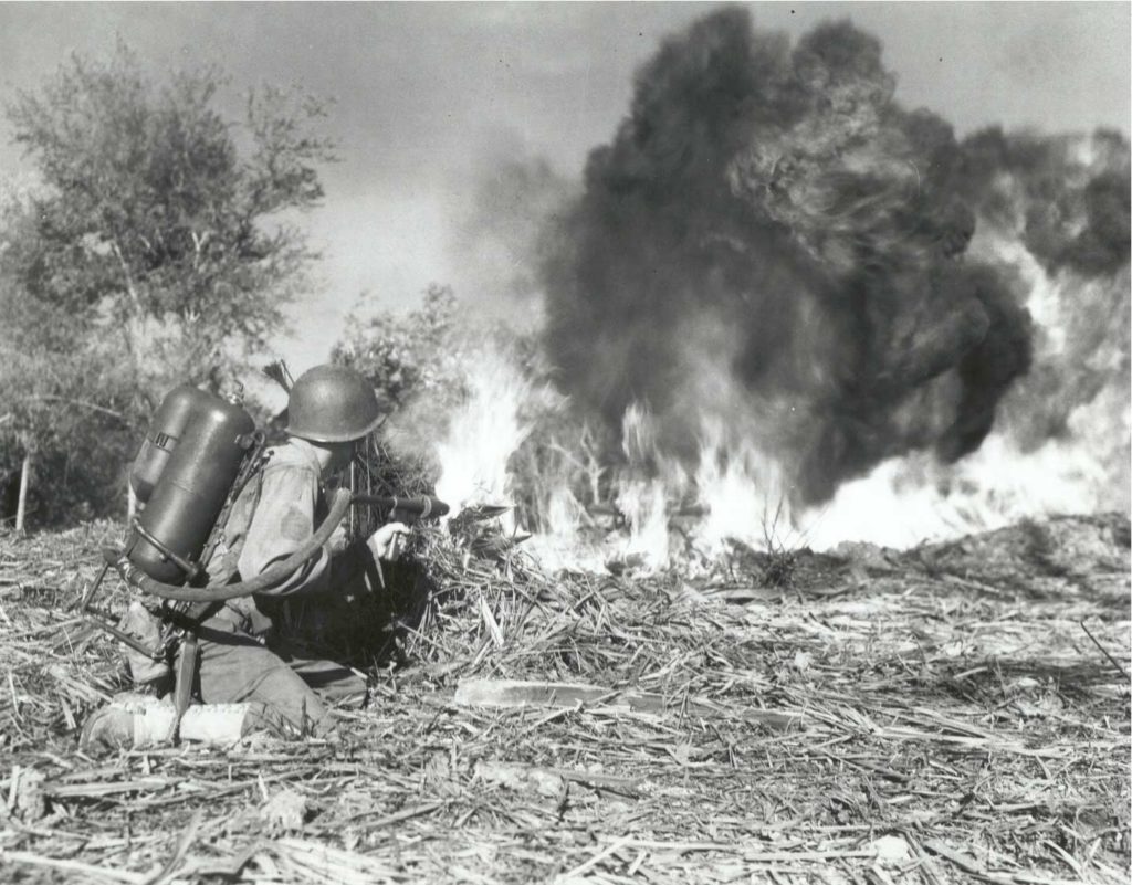 American soldier using a flamethrower