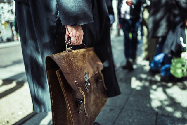 man holding briefcase