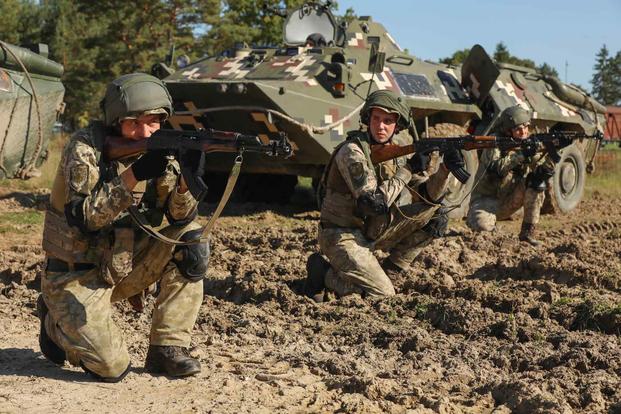American and Ukrainian soldiers exercise