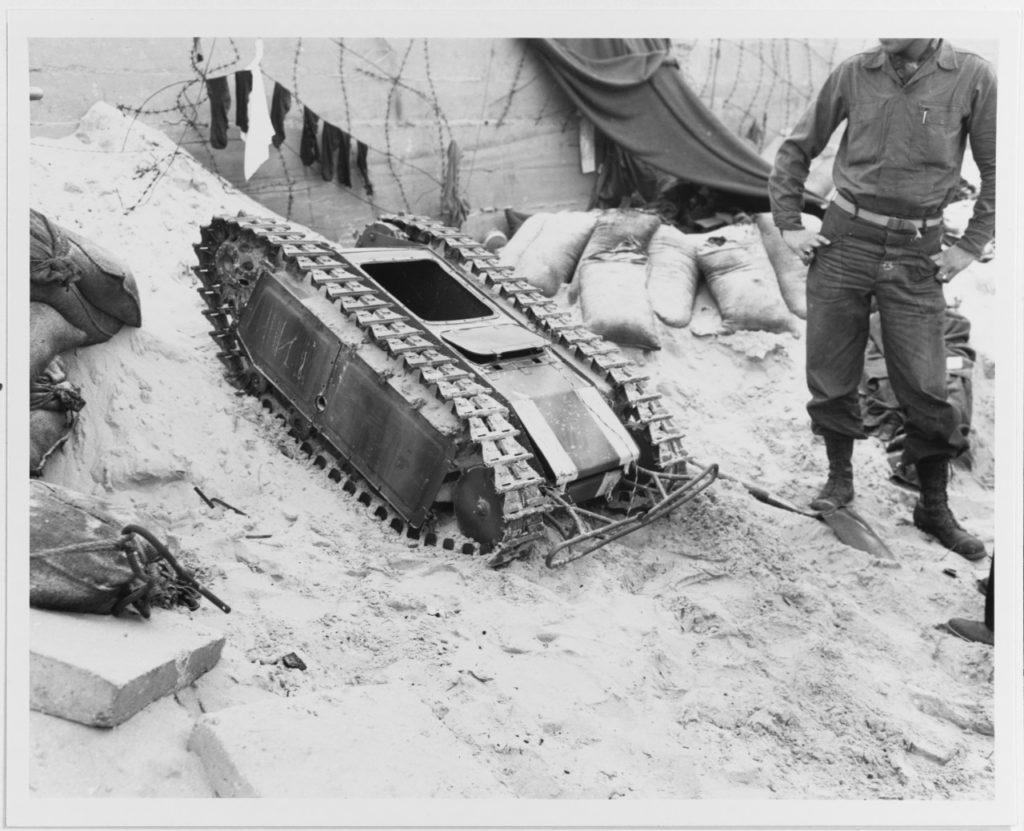  A German Beetle remote-controlled miniature tank, photographed on one of the invasion beaches (probably Utah Beach) shortly after the initial Normandy landings, June 1944 (Wikimedia Commons). Source: https://commons.wikimedia.org/wiki/File:26-G-2420_Normandy_Invasion,_June_1944.jpg