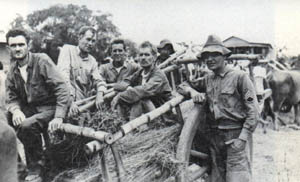 Liberated Cabanatuan POWs after the Great Raid riding on Carabaos, 1945 (Wikimedia Commons). Source: https://commons.wikimedia.org/wiki/File:POWs_on_Carts.jpg