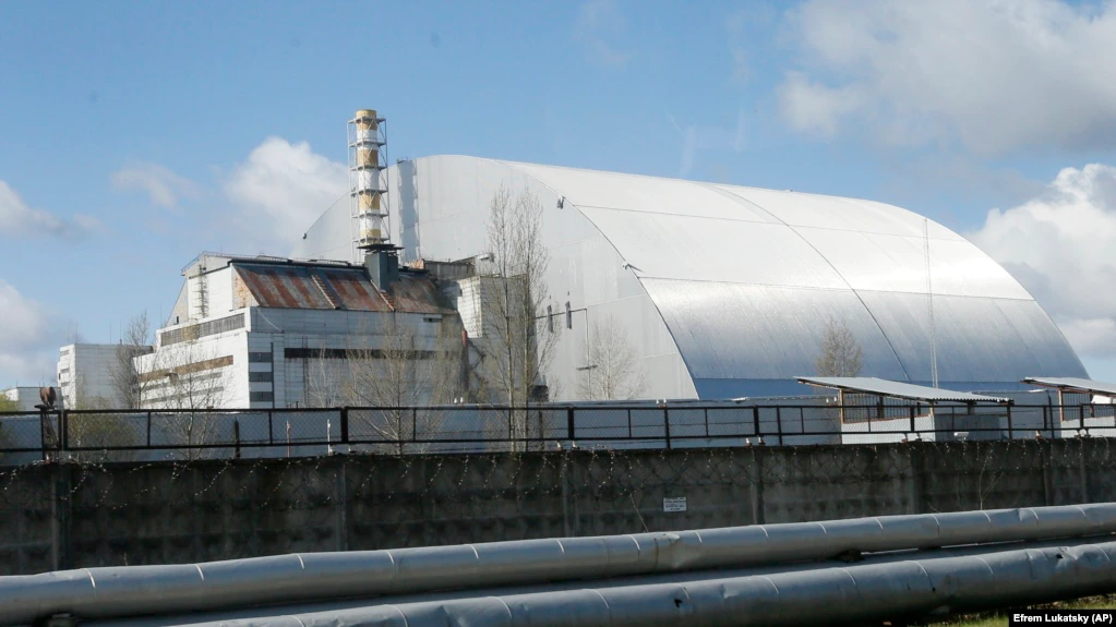 A shelter construction covers the exploded reactor at the Chernobyl nuclear plant, in Chernobyl, 2021. (Radio Free Europe). Source: https://www.rferl.org/a/ukraine-invasion-russian-forces-chernobyl-/31721240.html