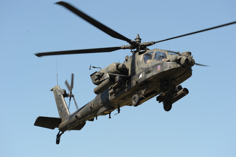 An AH-64 Apache helicopter with Task Force Viper, 1st Reconnaissance Battalion, 12th Combat Aviation Brigade, during a Apache Gunnery at Baumholder Military Training Area, 2018 (DVIDS). Source: https://www.dvidshub.net/image/4396629/apache-ah-64-helicopter-gunnery