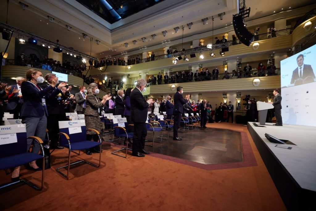 Ukrainian President Zelensky speaking to world leaders at the Munich Security Conference receiving a standing ovation (President Volodymyr Zelensky Official Website). Source: https://www.president.gov.ua/photos/thumbs/robochij-vizit-prezidenta-ukrayini-do-nimechchini-dlya-uchas-4449