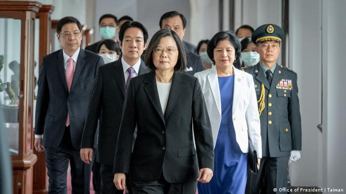 Taiwanese President Tsai Ing-wen along with several members of the Taiwanese government (DW). Source: https://www.dw.com/en/china-reunification-inevitable-as-taiwans-tsai-starts-second-term-in-office/a-53504220