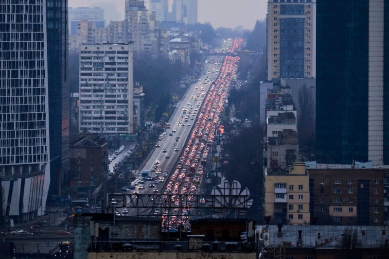 Inhabitants of Kyiv, Ukraine, leave the city following missile strikes by Russian armed forces on Feb. 24, 2022 (Getty Images via TIME). Source: https://time.com/6150708/russia-ukraine-invasion-war/ 