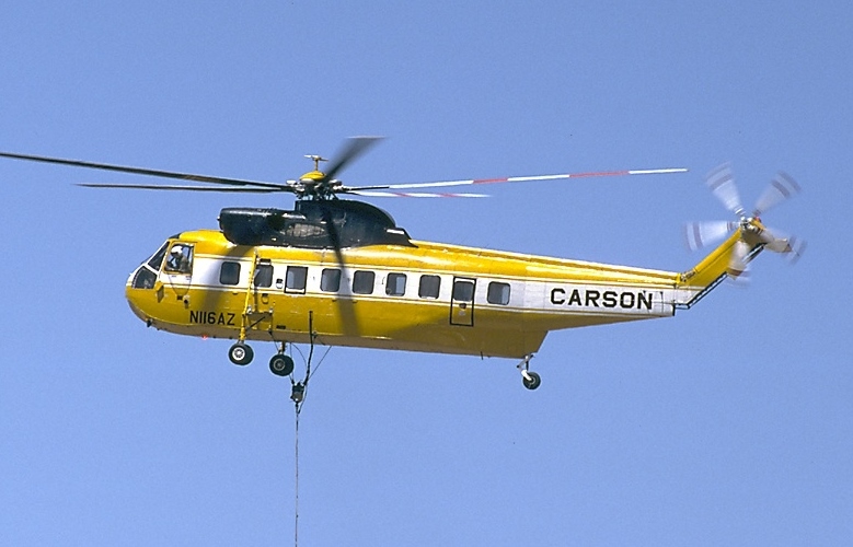 A Sikorsky S-61N making water drops in 2002 (Wikimedia Commons). Source: https://commons.wikimedia.org/wiki/File:Sikorsky_S-61N_Shortsky,_Carson_Helicopters_AN0263247.jpg