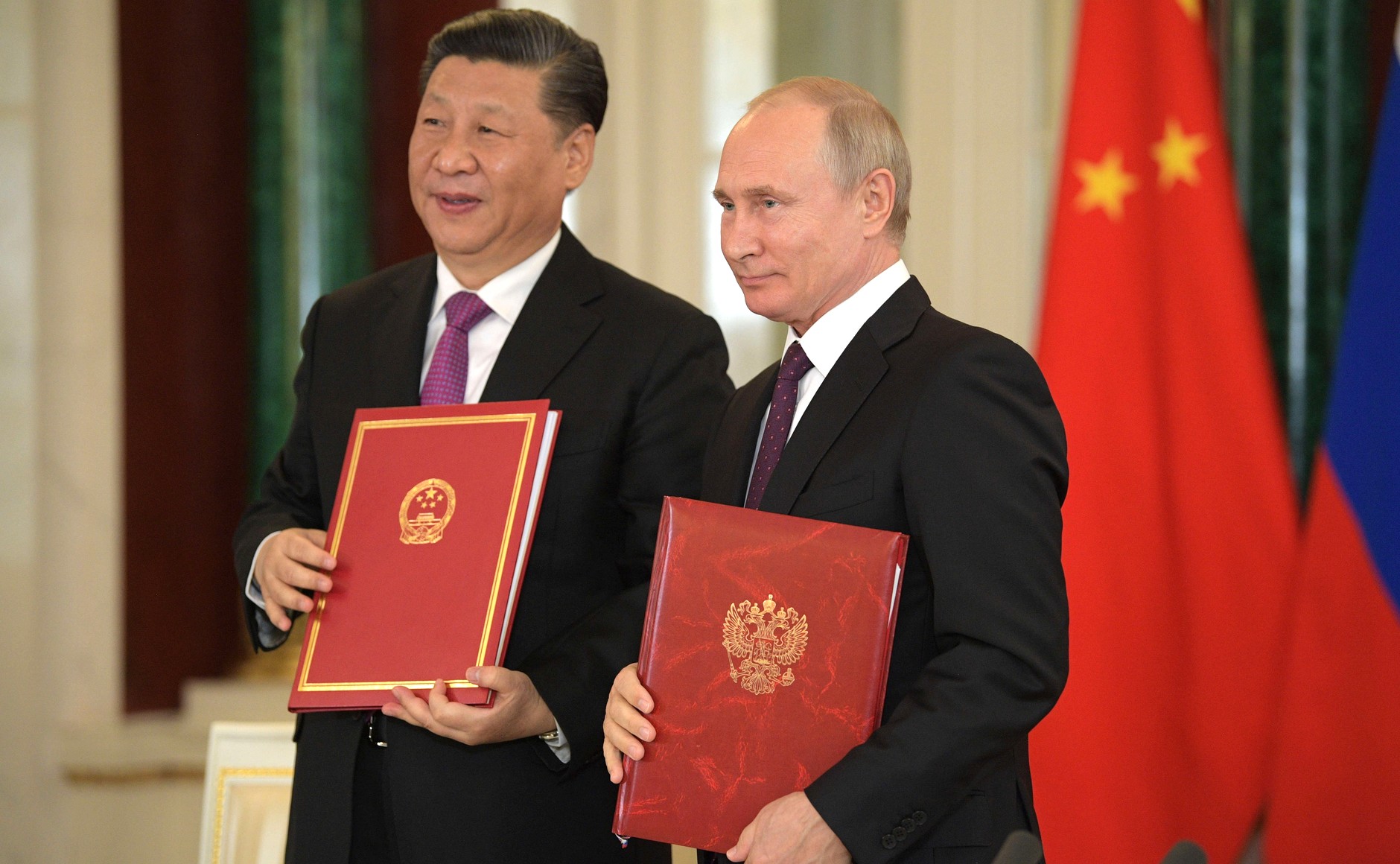 Vladimir Putin and Xi Jinping signed a Joint Statement on Developing Comprehensive Partnership and Strategic Cooperation Entering a New Era, and a Joint Statement on Strengthening Global Strategic Stability in the Modern Era, 2019 (Wikimedia Commons). Source: https://commons.wikimedia.org/wiki/File:Vladimir_Putin_and_Xi_Jinping_(2019-06-05)_40.jpg