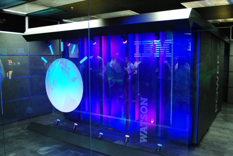 IBM's Watson super computer pictured in its facility (venturebeat.com). Source: https://venturebeat.com/2014/08/27/ibm-finally-opens-up-its-watson-supercomputer-to-researchers/