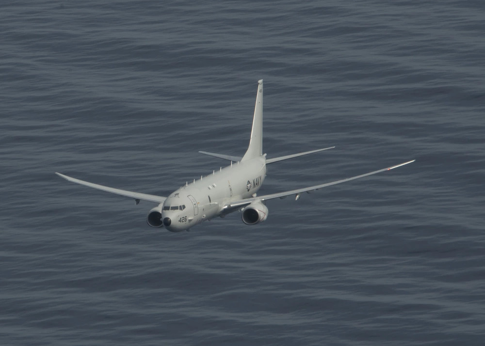 A P-8A Poseidon multi-mission maritime patrol and reconnaissance aircraft assigned to Patrol Squadron (VP) 4, flies over the Atlantic Ocean during a photo exercise, March 29, 2020 (US Navy/DVIDS). Source: https://www.dvidshub.net/image/6157216/vp-4-p-8a-poseidon-transits-atlantic-ocean