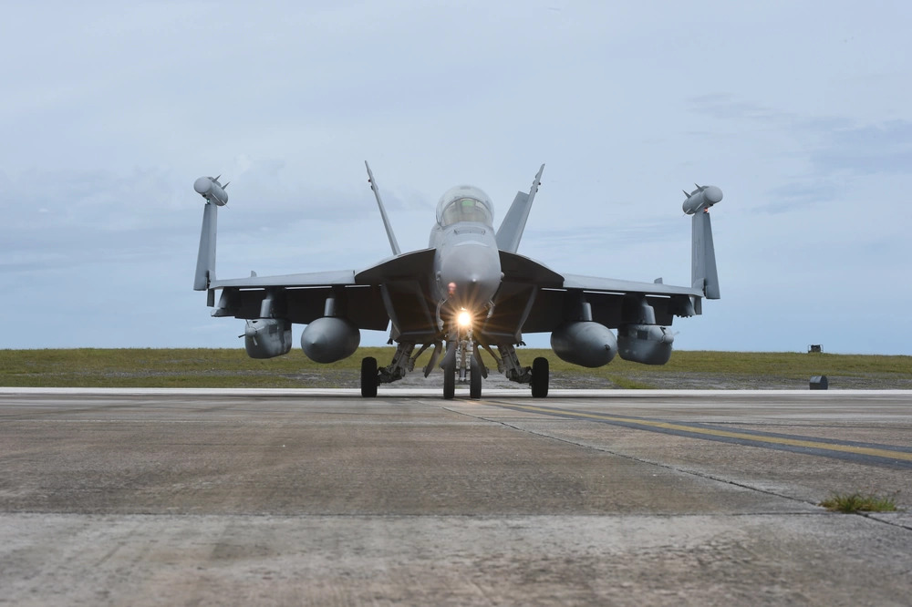 An EA-18G Growler from Electronic Attack Squadron 138 (VAQ), “Yellow Jackets”, taxis at Andersen Air Force Base Guam during Valiant Shield Sept. 23, 2018 (DVIDS, U.S. Navy Photo by Mass Communications Specialist 1st Class Jimmie Crockett). Source: https://www.dvidshub.net/image/4767778/us-navy-ea-18g-growler-taxis
