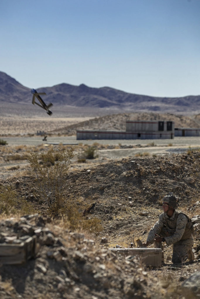 U.S. Marine Corps Cpl. Graham Rouse with 1st Battalion, 6th Marine Regiment, launches the Switchblade 300, a weaponized Small Unmanned Air System, at Range 230 for Integrated Training Exercise (ITX) 1-20 on Marine Corps Air Ground Combat Center, Twentynine Palms, California, Oct. 23, 2019. The purpose of ITX 1-20 is to create a challenging, realistic training environment that produces combat-ready forces capable of operating as an integrated Marine Air Ground Task Force. (DVIDS, U.S. Marine Corps photo by Cpl. Timothy J. Lutz). Source: https://www.dvidshub.net/image/5861379/us-marines-1-6-conduct-live-fire-mout 