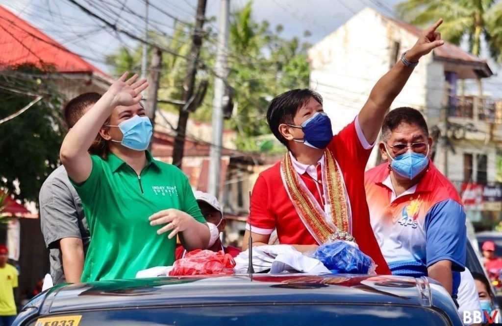 Presidential candidate Ferdinand "Bongbong" Marcos with Vice-Presidential candidate Sara Duterte in a campaign rally in Tacloban City, Philippines (Bongbong Marcos Facebook Page). Source: https://www.facebook.com/photo.php?fbid=444956336998952&set=pb.100044537672013.-2207520000..&type=3