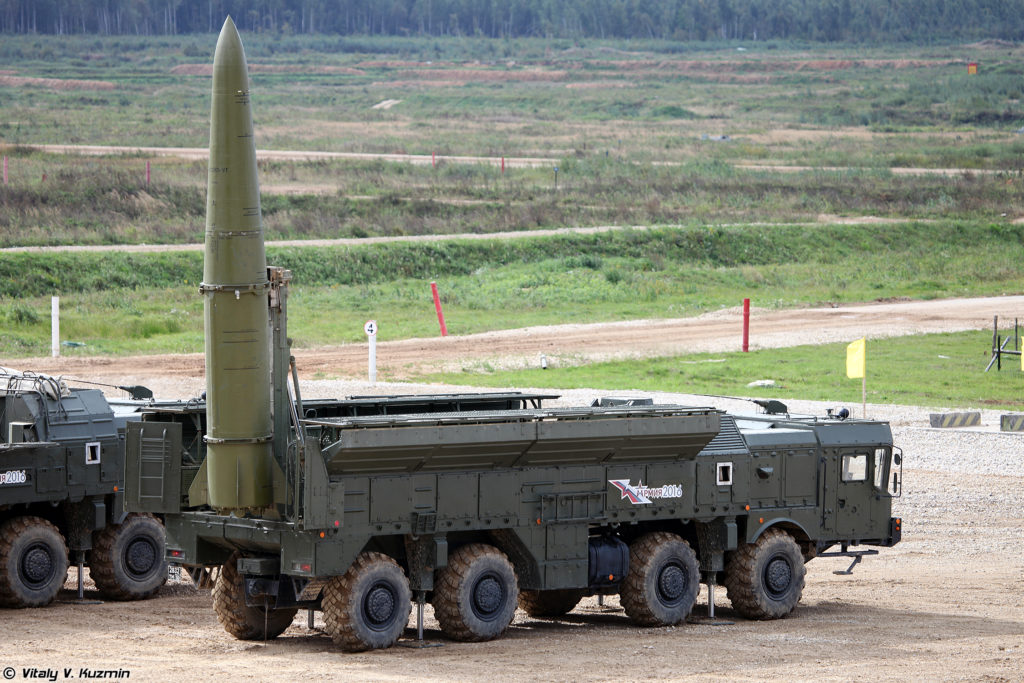 An Iskander-M on the 9P78-1 transporter erector launcher during a military forum (Wikipedia). Source: https://en.wikipedia.org/wiki/9K720_Iskander#/media/File:Army2016demo-075.jpg