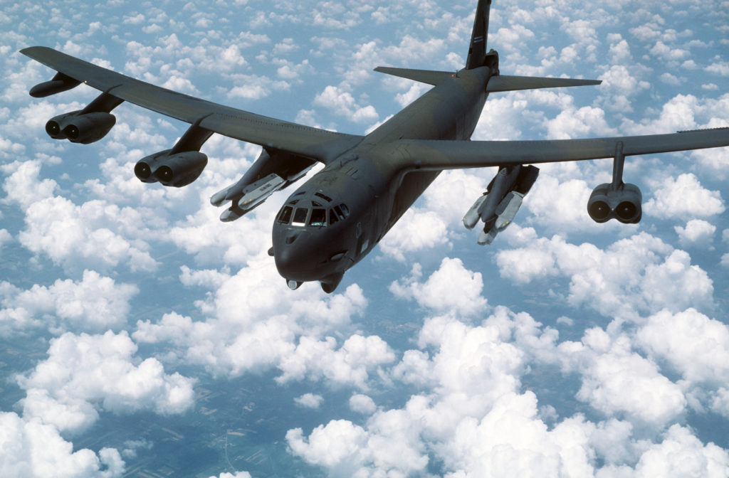 An air-to-air front view of a B-52G Stratofortress aircraft from the 416th bombardment Wing armed with AGM-86B air-launched cruise missiles (ALCMs) (Wikimedia Commons). Source: https://commons.wikimedia.org/wiki/File:B-52G_with_AGM-86B_ALCMs.JPEG