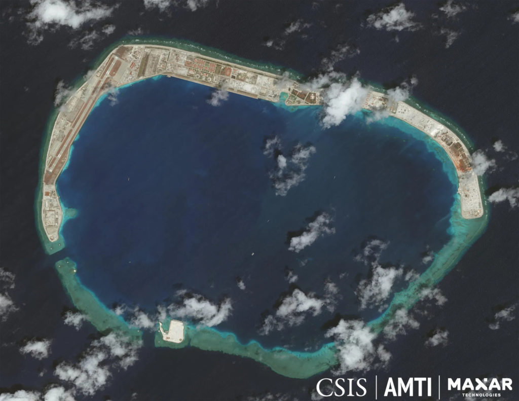 An satellite photograph of Mischief Reef taken by Maxar in 2020 (Asia Martime Transparency Initiative). Source: https://amti.csis.org/mischief-reef/#DetailImages-heading