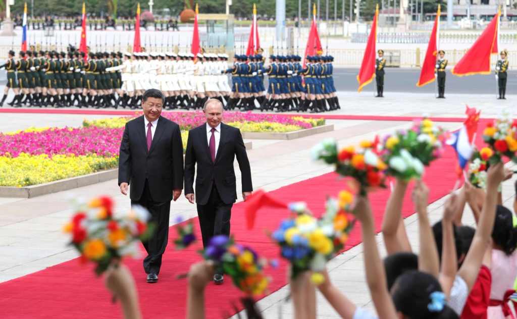 Official ceremony to welcome the President of Russia Vladimir Putin. With President of the People’s Republic of China Xi Jinping (Wikimedia Commons). Source: https://commons.wikimedia.org/wiki/File:The_President_of_Russia_arrived_in_China_on_a_state_visit._01.jpg