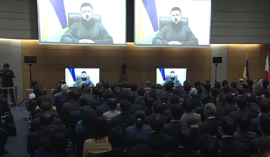 Ukrainian President Volodymyr Zelensky during his speech at the Japanese Parliament where he criticized the UN for being ineffective in enforcing its resolutions (Screenshot from 日テレNEWS YouTube Account). Source: https://www.youtube.com/watch?v=xJg__zAlfEw